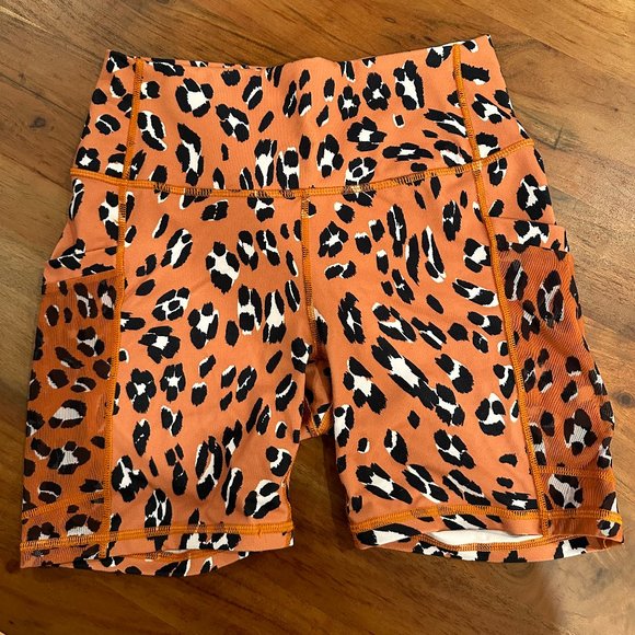 Fabletics On-The-Go PowerHold® High-Waisted Short in Orange Leopard Print - Picture 1 of 5